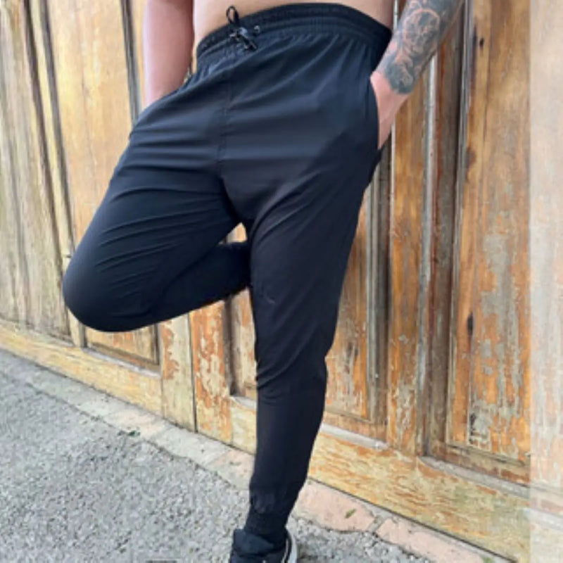 Calça esportiva fina de seda de gelo masculina, estilo solto, calça casual seca rápida, longa respirável,alta elasticidade,verão