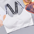 Roupa interior traseira com a letra traseira para mulheres, sutiã sem underwire integrado com o coxim da caixa, correia do coração, aptidão, ioga